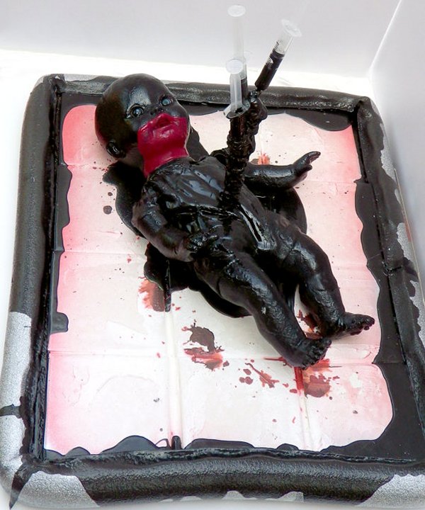 fetus tar sculpture