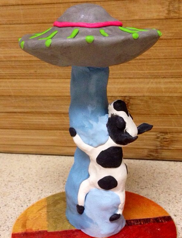 UFO Beaming Up A Cow