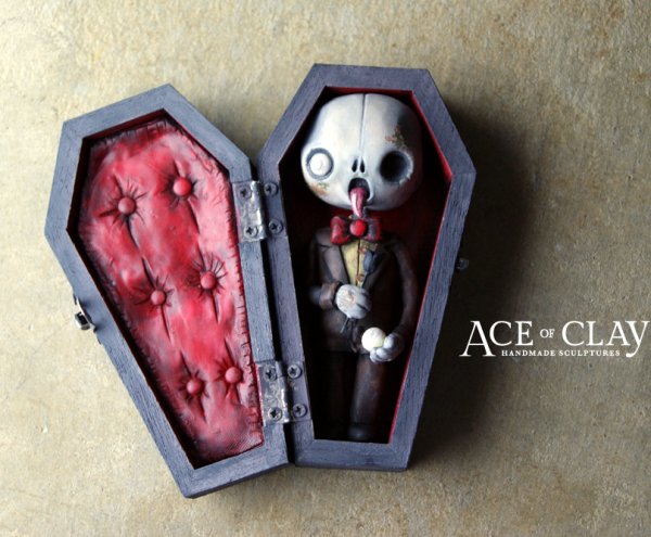 Cute Zombie In Coffin Sculpture