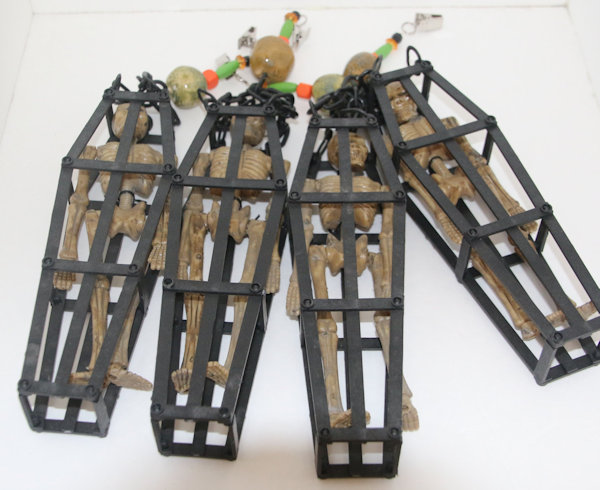 Caged Skeleton Table Cloth Weights