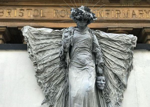 Creepy Statue Appears Overnight in English City - Mothwoman?