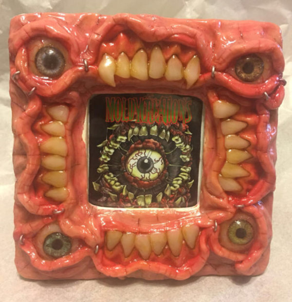 Toothy Picture Frame With Eyeballs